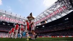 The players of Ajax and of Feyenoord Rotterdam with the mascot walk out for the Dutch Eredivisie match between Ajax Amsterdam and Feyenoord at Amsterdam ArenA on April 2, 2017 in Amsterdam