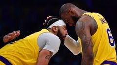 Apr 11, 2023; Los Angeles, California, USA; Los Angeles Lakers forward LeBron James (6) with forward Anthony Davis (3) during a stoppage in play against the Minnesota Timberwolves in the second half at Crypto.com Arena. Mandatory Credit: Gary A. Vasquez-USA TODAY Sports