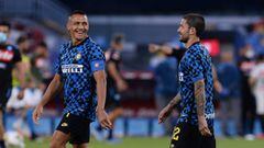 13 June 2020, Italy, Naples: Inter Milan's Alexis Sanchez (L) and Stefano Sensi warm up prior to the start of the Coppa Italia semi final soccer match between SSC Napoli and Inter Milan at San Paolo Stadium. Photo: Cafaro/Lapresse via ZUMA Press/dpa    13/06/2020 ONLY FOR USE IN SPAIN