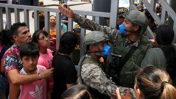 Soldiers control the access to the Gamarra textile market after Peru&#039;s government deployed military personnel to block major roads, as the country rolled out a 15-day state of emergency to slow the spread of coronavirus disease (COVID-19), in Lima, P