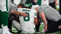 Sep 11, 2023; East Rutherford, New Jersey, USA; New York Jets quarterback Aaron Rodgers (8) is injured after a sack by Buffalo Bills defensive end Leonard Floyd (not pictured) during the first quarter at MetLife Stadium. Mandatory Credit: Robert Deutsch-USA TODAY Sports