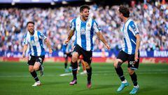 BARCELONA, SPAIN - MARCH 05: Leandro Cabrera (C) of RCD Espanyol celebrates with his teammates Keidi Bare (L) and Javier Puado (R) after scoring the opening goal during the LaLiga Santander match between RCD Espanyol and Getafe CF at RCDE Stadium on March