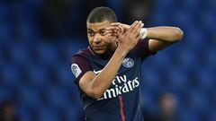 Paris Saint-Germain&#039;s French forward Kylian MBappe reacts at the end of the French Ligue 1 football match between Paris Saint-Germain and Angers at the Parc des Princes stadium in Paris on March 14, 2018.    / AFP PHOTO / FRANCK FIFE