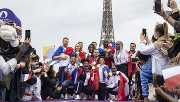 Members of the French Olympic Judo team pose with their medals during a homecoming ceremony in front of the Eiffel Tower, which also serves to promote the upcoming Paris 2024 Olympic Games, in Paris, France, 02 August 2021.