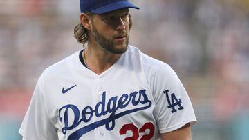 LOS ANGELES, CALIFORNIA - SEPTEMBER 23: Clayton Kershaw #22 of the Los Angeles Dodgers reacts as he leaves the mound at the end of the first inning against the San Francisco Giants at Dodger Stadium on September 23, 2023 in Los Angeles, California.   Harry How/Getty Images/AFP (Photo by Harry How / GETTY IMAGES NORTH AMERICA / Getty Images via AFP)