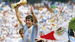 MEXICO CITY, MEXICO - JUNE 29: Diego Maradona of Argentina holds the World Cup trophy after defeating West Germany 3-2 during the 1986 FIFA World Cup Final match at the Azteca Stadium on June 29, 1986 in Mexico City, Mexico. (Photo by Archivo El Grafico/G