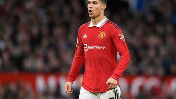 (FILES) In this file photo taken on October 30, 2022 Manchester United's Portuguese striker Cristiano Ronaldo looks on during the English Premier League football match between Manchester United and West Ham United at Old Trafford in Manchester, north-west England, on October 30, 2022. - Manchester United said on November 14, 2022 they were "considering their response" to an interview given by star forward Cristiano Ronaldo where he said he felt "betrayed" by the club. (Photo by Oli SCARFF / AFP) / RESTRICTED TO EDITORIAL USE. No use with unauthorized audio, video, data, fixture lists, club/league logos or 'live' services. Online in-match use limited to 120 images. An additional 40 images may be used in extra time. No video emulation. Social media in-match use limited to 120 images. An additional 40 images may be used in extra time. No use in betting publications, games or single club/league/player publications. / 