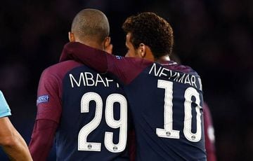 Mbappé (left) and Neymar celebrate during PSG's thumping of Celtic.