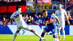 BUENOS AIRES, ARGENTINA - MAY 07: Lucas Menossi of Tigre fights for the ball with Cristian Medina of Boca Juniors during a match between Tigre and Boca Juniors as part of Copa de la Liga 2022 at Jose Dellagiovanna on May 7, 2022 in Buenos Aires, Argentina. (Photo by Marcelo Endelli/Getty Images)