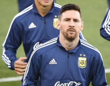 Argentina's forward Lionel Messi (C) and teammates attend a training session at the Real Madrid's training facilities of Valdebebas in Madrid