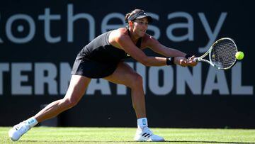 EASTBOURNE, ENGLAND - JUNE 20: Garbine Muguruza of Spain in action during her first round match against Magdalena Frech of Poland on day three of the Rothesay International Eastbourne at Devonshire Park on June 20, 2022 in Eastbourne, England. (Photo by Charlie Crowhurst/Getty Images for LTA)