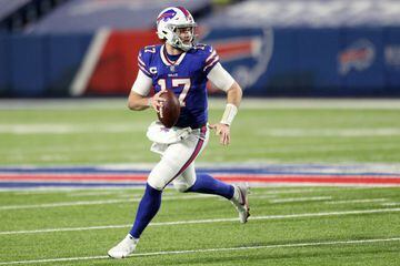 ORCHARD PARK, NEW YORK - JANUARY 16: Josh Allen #17 of the Buffalo Bills looks to pass in the first half against the Baltimore Ravens during the AFC Divisional Playoff game at Bills Stadium on January 16, 2021 in Orchard Park, New York.