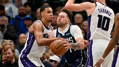 Dallas Mavericks guard Luka Doncic (77) drives to the basket past Sacramento Kings forward Keegan Murray (13) during the first quarter at the American Airlines Center.