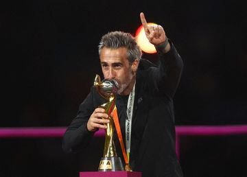 Jorge Vilda celebrates with the trophy after winning the World Cup.