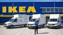 Ikea Netherlands&#039; CEO Paul de Jong poses in front of electric vehicles on April 26, 2021 outside an Ikea store in Amsterdam which is the second city in the world after Shanghai where IKEA will deliver all packages with electric vehicles. (Photo by Ev