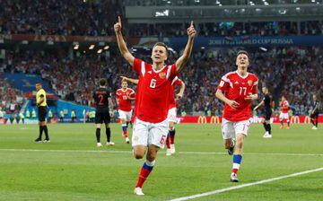 Russia's Denis Cheryshev celebrates scoring their first goal