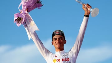 UAE Team Emirates XRG's Mexican rider Isaac Del Toro wearing the best young rider's white jersey (Maglia Bianca) celebrates on the podium at the end of the 21st and last stage of the 108th Giro d'Italia cycling race of 143kms from Rome to Rome on June 1, 2025. (Photo by Luca Bettini / AFP)