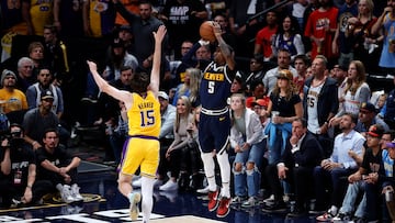 Denver Nuggets guard Kentavious Caldwell-Pope (5) shoots against Los Angeles Lakers guard Austin Reaves (15)