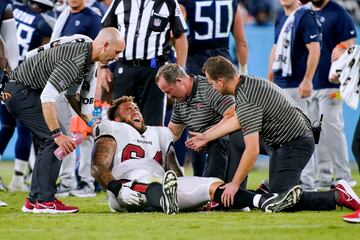 Trainers tend to Tampa Bay Buccaneers guard Aaron Stinnie during the third quarter of a preseason game at Nissan Stadium. (Photo: Andrew Nelles-USA TODAY Sports via Reuters).