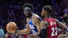 May 6, 2022; Philadelphia, Pennsylvania, USA; Philadelphia 76ers center Joel Embiid (21) controls the ball against Miami Heat forward Jimmy Butler (22) during the third quarter in game three of the second round for the 2022 NBA playoffs at Wells Fargo Center. Mandatory Credit: Bill Streicher-USA TODAY Sports