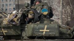 A Ukrainian service member rides a tank, as Russia's attack on Ukraine continues, near the frontline town of Vuhledar, Ukraine February 22, 2023. REUTERS/Alex Babenko