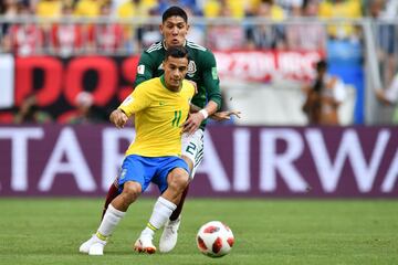 Philippe Coutinho y Edson Álvarez.