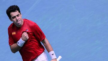Spain's Jaume Munar Clar celebrates after winning against Czech Republic's Jiri Lehecka during the Davis Cup men's singles quarter finals tennis match, at the Super Tennis Arena, in Bologna, northen Italy, on November 20, 2025. (Photo by Tiziana FABI / AFP)
