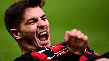 AC Milan's Spanish midfielder Brahim Diaz celebrates after opening the scoring during the UEFA Champions League round of 16, first leg football match between AC Milan and Tottenham Hotspur on February 14, 2023 at the San Siro stadium in Milan. (Photo by Marco BERTORELLO / AFP)