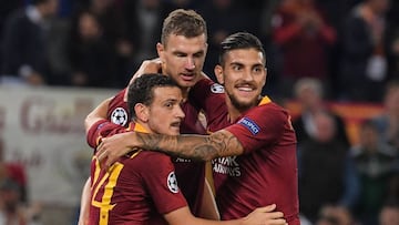 (From L) AS Roma Italian midfielder Alessandro Florenzi, AS Roma Bosnian forward Edin Dzeko and AS Roma Italian midfielder Lorenzo Pellegrini celebrate after Dzeko scored during the UEFA Champions League group G stage football match AS Roma vs CSKA Moscow