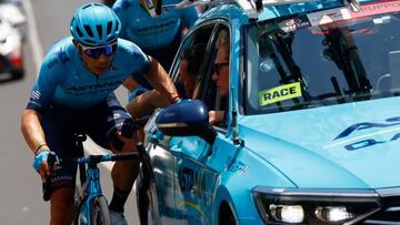 Team Astana's Colombian rider Miguel Angel Lopez talks to his sports team as he rides in the first kilometers of the 4th stage of the Giro d'Italia 2022 cycling race, 172 kilometers between Avola and Etna-Nicolosi, Sicily, on May 10, 2022. (Photo by Luca Bettini / AFP) (Photo by LUCA BETTINI/AFP via Getty Images)