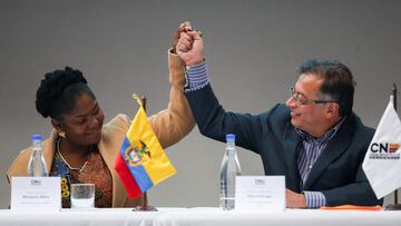 Colombia's President-elect Gustavo Petro and Vice President-elect Francia Marquez hold hands as they attend an event to receive their credentials as elected president and vice president from Colombia's National Electoral Council, in Bogota, Colombia June 23, 2022. REUTERS/Luisa Gonzalez     TPX IMAGES OF THE DAY