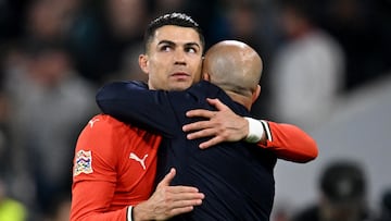 Soccer Football - Nations League - Final - Portugal v Spain - Allianz Arena, Munich, Germany - June 8, 2025 Portugal's Cristiano Ronaldo hugs Portugal coach Roberto Martinez as he is substituted off REUTERS/Angelika Warmuth