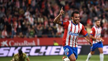 Girona's Spanish defender #25 Eric Garcia celebrates scoring the opening goal during the Spanish league football match between Girona FC and Granada FC at the Montilivi stadium in Girona on May 24, 2024. (Photo by MANAURE QUINTERO / AFP)