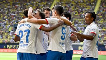 Barcelona's Spanish midfielder #06 Gavi celebrates with Barcelona's Spanish forward #27 Lamine Yamal (L) scoring his team's first goal during the Spanish Liga football match between Villarreal CF and FC Barcelona at La Ceramica stadium in Vila-real on August 27, 2023. (Photo by JAVIER SORIANO / AFP)