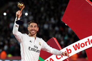 Sergio Ramos holds the FIFA Club World Cup trophy for best player in 2014
