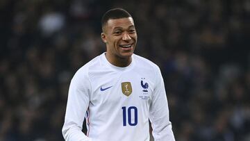 French forward Kylian Mbappe celebrates after scoring a goal from the penalty-kick during the friendly football match between France and South Africa at Pierre-Mauroy stadium in Villeneuve-d'Ascq, near Lille, northern France, on March 29, 2022. (Phot
