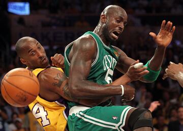 Kevin Garnett #5 of the Boston Celtics and Kobe Bryant #24 of the Los Angeles Lakers battle for the ball in the first period of Game Six of the 2010 NBA Finals