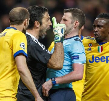 Buffon overstepping the mark with referee Oliver.