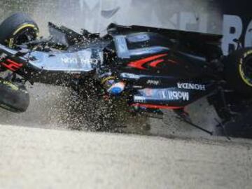 Fernando Alonso said he was just "happy to be alive" after surviving a terrifying high-speed smash when his McLaren flipped and flew upside-down into a barrier. It demonstrated just how safe F1 cars are, even without the proposed cockpit "halo" head-heigh