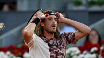 Greece's Stefanos Tsitsipas reacts during his 2023 ATP Tour Madrid Open tennis tournament singles match against Argentina's Sebastian Baez at the Caja Magica in Madrid on May 1, 2023. (Photo by OSCAR DEL POZO / AFP)