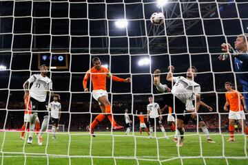 Dutch delight | Virgil Van Dijk scores his side's first goal against Germany.
