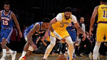 Jan 7, 2020; Los Angeles, California, USA; New York Knicks guard Elfrid Payton (6) and Los Angeles Lakers forward Anthony Davis (3) battle for a loose ball in the second quarter at Staples Center. Mandatory Credit: Kirby Lee-USA TODAY Sports
