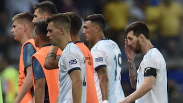 Argentina&#039;s Lionel Messi (R) is pictured after tying 1-1 with Paraguay in their Copa America football tournament group match at the Mineirao Stadium in Belo Horizonte, Brazil, on June 19, 2019. (Photo by Douglas Magno / AFP)