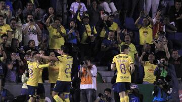 America's Uruguayan midfielder #07 Brian Rodriguez (unseen) celebrates with teammates after scoring a goal during the Liga MX Clausura football match between America and Tigres at the Sports City Stadium in Mexico City on March 29, 2025. (Photo by Victor Cruz / AFP)