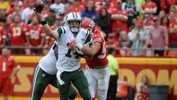 Sep 25, 2016; Kansas City, MO, USA; New York Jets quarterback Ryan Fitzpatrick (14) throws a pass under pressure from Kansas City Chiefs outside linebacker Frank Zombo (51) in the first half at Arrowhead Stadium. Mandatory Credit: John Rieger-USA TODAY Sports