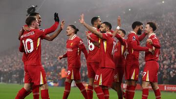 LIVERPOOL, ENGLAND - DECEMBER 26: Curtis Jones celebrates scoring the team's second goal during the Premier League match between Liverpool FC and Leicester City FC at Anfield on December 26, 2024 in Liverpool, England. (Photo by Copa/Getty Images)
