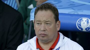 Russia coach Leonid Slutski stands before the Euro 2016 Group B soccer match between Russia and Wales at the Stadium municipal in Toulouse, France, Monday, June 20, 2016. (AP Photo/Thanassis Stavrakis)