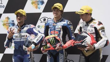SPIELBERG, AUSTRIA - AUGUST 11: (L-R) Jorge Martin of Spain and Del Conca Gresini Moto3, Marco Bezzecchi of Italy and Pruestel GP and Albert Arenas of Spain and Angel Nieto Team Moto3 pose at the end of the Moto3 qualifying practice during the MotoGp o