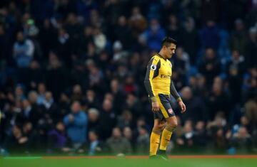 Alexis Sanchez of Arsenal is dejected after the final whistle during the Premier League match between Manchester City and Arsenal