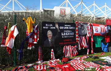 Tributes to former Stoke City and England goalkeeping legend Gordon Banks adorn a fence outside the bet365 Stadium.